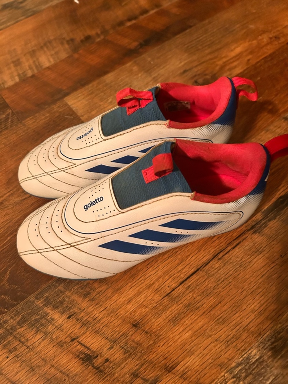 Kids Blue and White Soccer Cleats with Red Accents